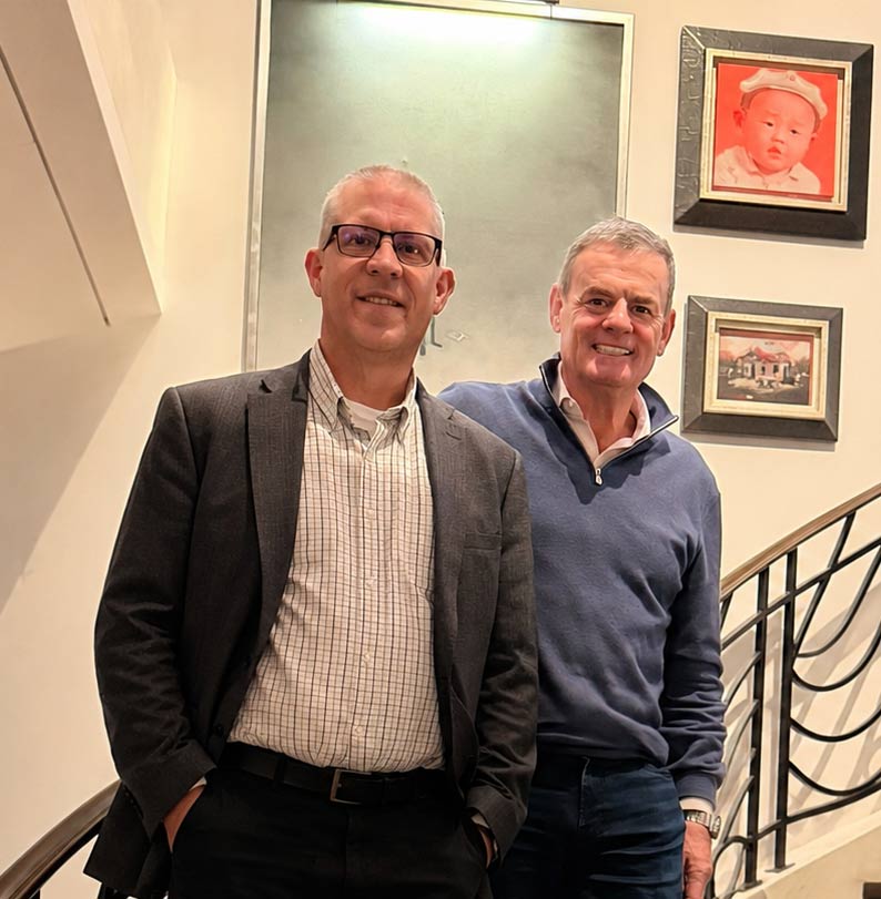 Weaver co-founders Doug and Peter standing together